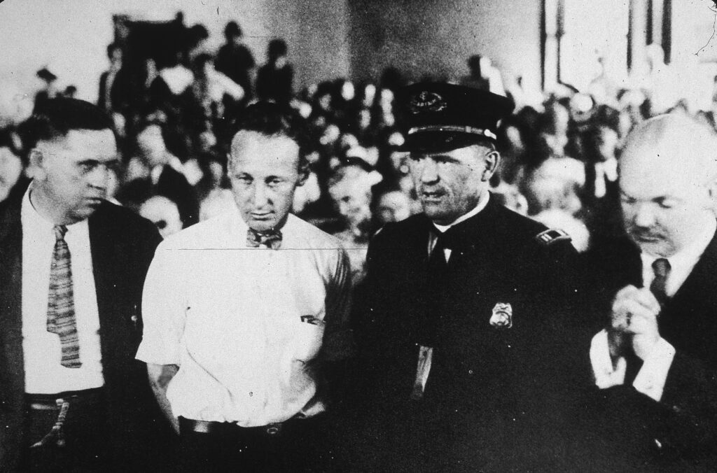 100 years after John Scopes was convicted of teaching evolution, education is again on trial
