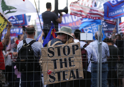 Supporters of President Donald Trump demonstrate at a &lsquo;Stop the Steal&rsquo; rally in front of the Maricopa County Elections Department office on November 7, 2020 in Phoenix, Arizona. The demonstration began at the State Capitol earlier in the day. News outlets project that Joe Biden will be the 46th president of the United States after a victory in Pennsylvania with Kamala Harris to be the first woman and person of color to be elected Vice President. (Photo by Mario Tama/Getty Images)