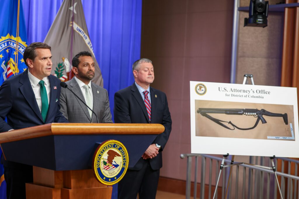 Acting Attorney General Todd Blanche speaks as FBI Director Kash Patel and acting Assistant FBI Director for the Criminal Investigative Division Darren Cox listen at a press conference at the Department of Justice on April 27, 2026, in Washington, D.C. (Photo by Tasos Katopodis/Getty Images)