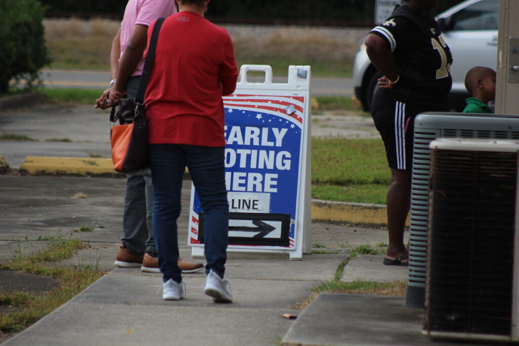 East Baton Rouge Parish, Louisiana, voters stand in line at an early voting location in 2022. Louisiana Gov. Jeff Landry has suspended Louisiana&rsquo;s May 16, 2026, party primary elections for six U.S. House districts &mdash; after early voting had begun &mdash; following the U.S. Supreme Court&rsquo;s decision to throw out the state&rsquo;s existing congressional map. (Photo by Wes Muller/Louisiana Illuminator.)