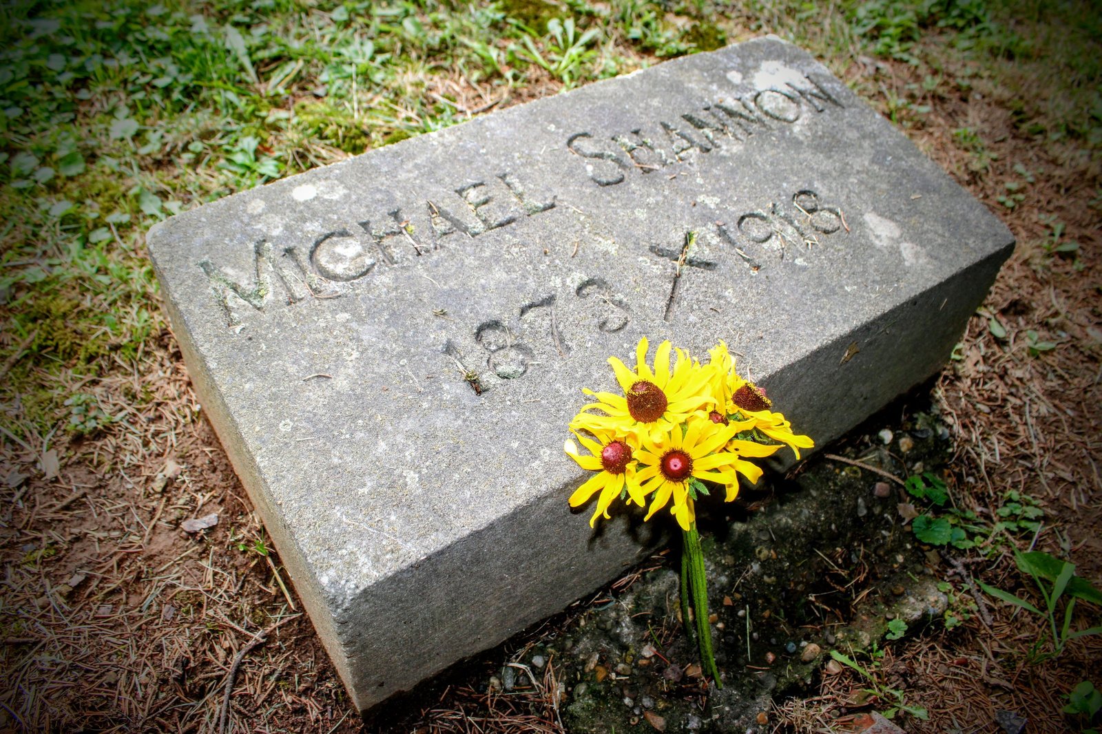 Mickey Shannon headstone with flowers, Calvary Cemetery