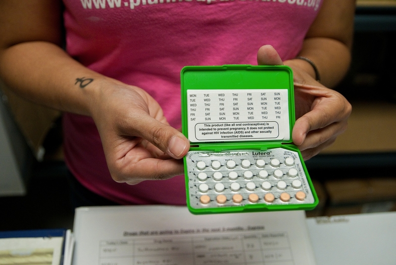 An individual wearing a pink Planned